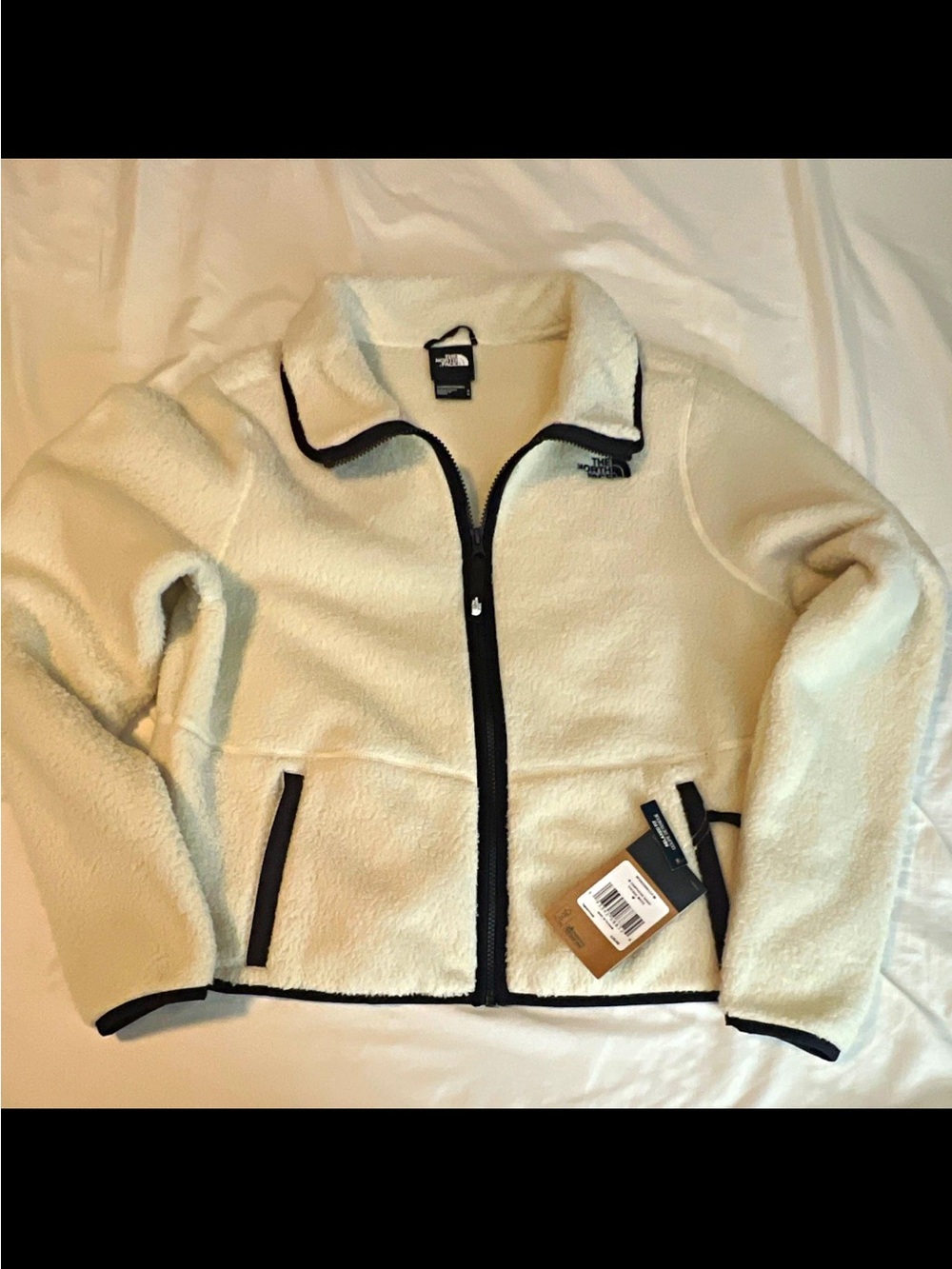 The North Face Cream Fleece Jacket with Black Trim
